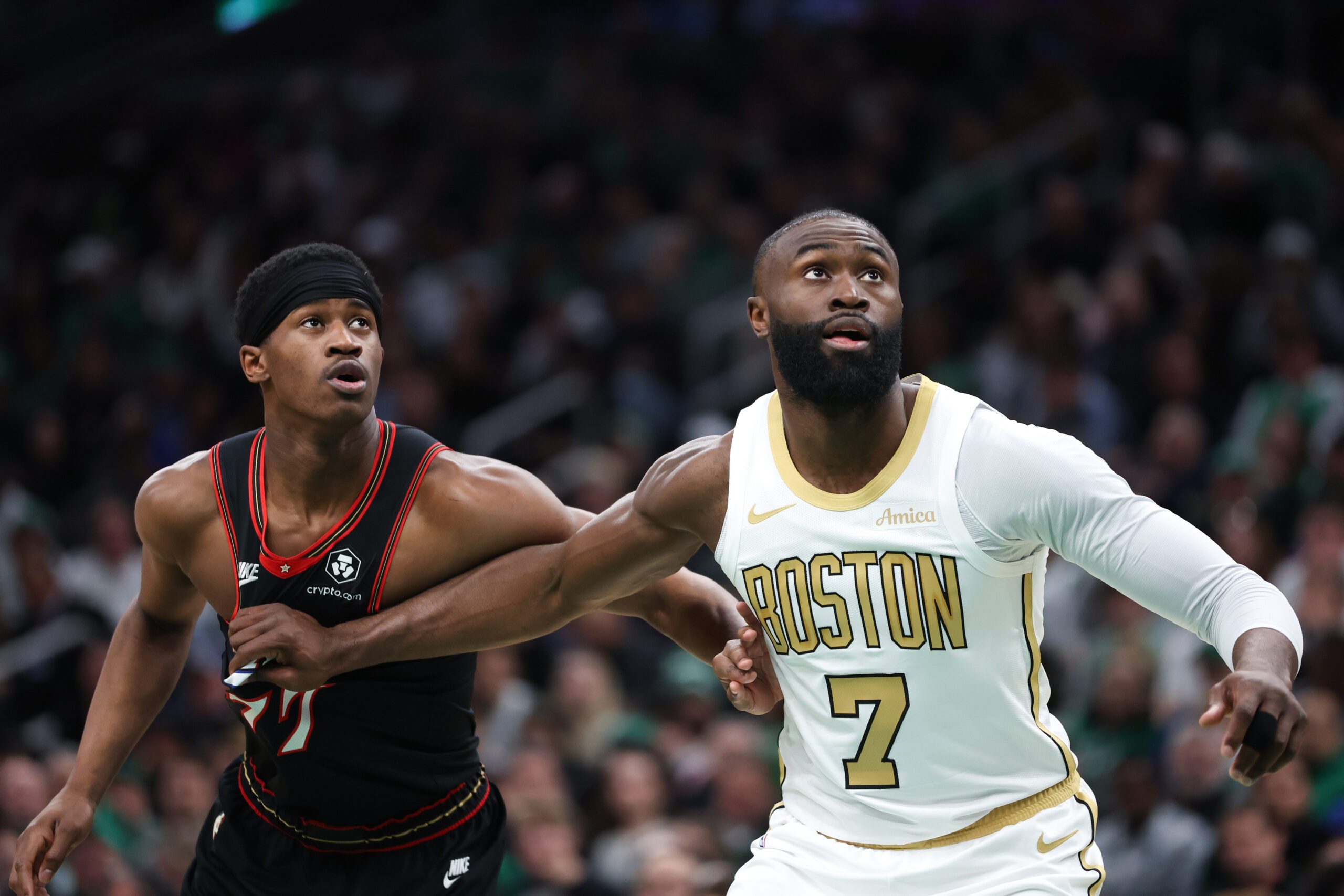 Mar 1, 2026; Boston, Massachusetts, USA; Boston Celtics forward Jaylen Brown (7) boxes out Philadelphia 76ers guard VJ Edgecombe (77) during the first half at TD Garden. Mandatory Credit: Paul Rutherford-Imagn Images