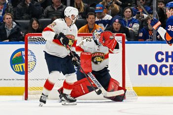 Mar 1, 2026; Elmont, New York, USA;  Florida Panthers goaltender Sergei Bobrovsky (72) makes a glove save against the New York Islanders during the third period at UBS Arena. Mandatory Credit: Dennis Schneidler-Imagn Images