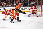 Mar 1, 2026; Anaheim, California, USA; Anaheim Ducks left wing Cutter Gauthier (61) attempts a shot while Calgary Flames defenseman Zach Whitecloud (28) attempts to block during the second period at Honda Center. Mandatory Credit: Corinne Votaw-Imagn Images