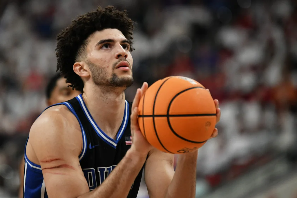 Mar 2, 2026; Raleigh, North Carolina, USA; Duke Blue Devils forward Cameron Boozer (12) shoots a free throw during the second half against the NC State Wolfpack at Lenovo Center. Mandatory Credit: Zachary Taft-Imagn Images