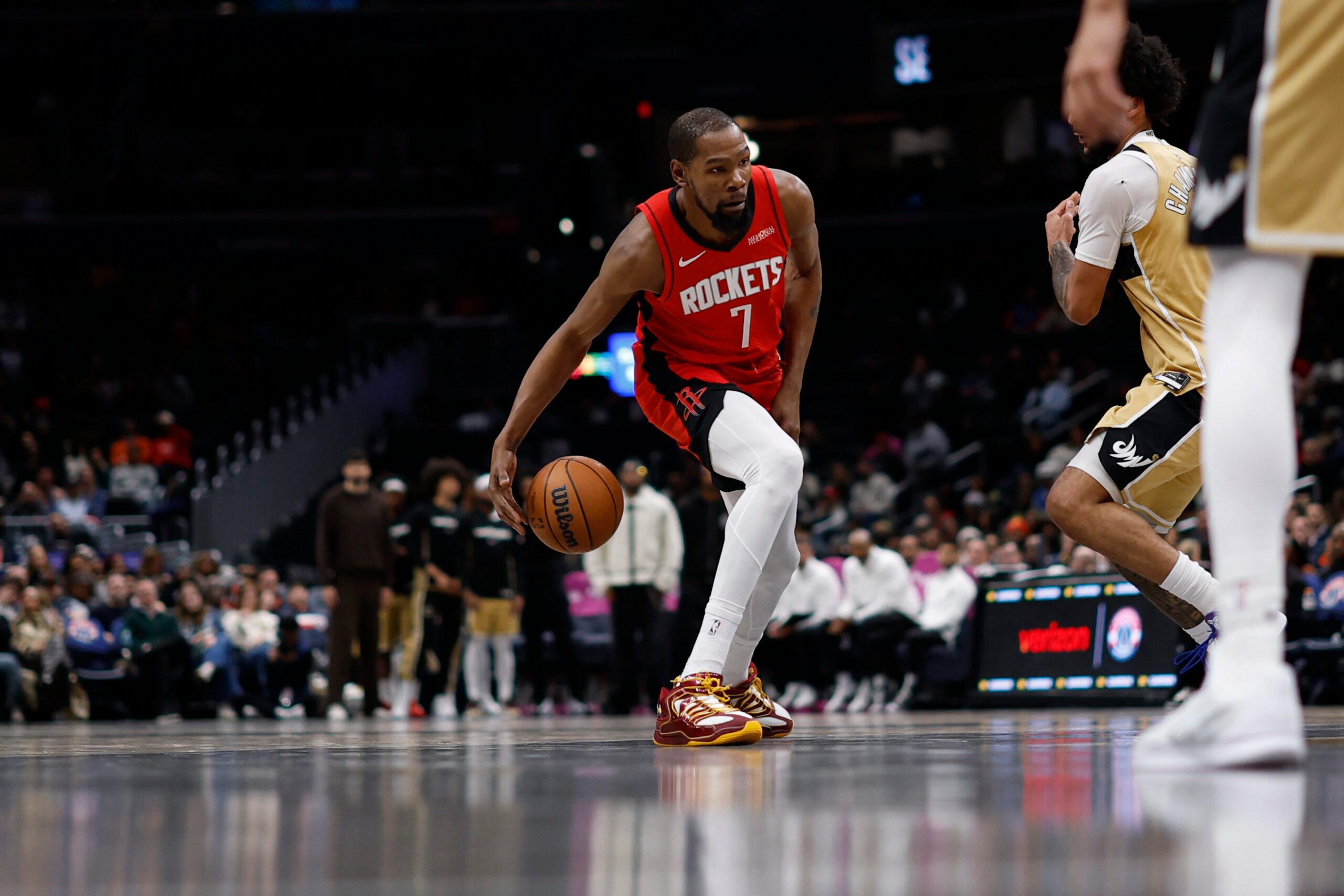 Mar 2, 2026; Washington, District of Columbia, USA; Houston Rockets forward Kevin Durant (7) dribbles the ball as Washington Wizards forward Justin Champagnie (9) defends in the second half at Capital One Arena. Mandatory Credit: Geoff Burke-Imagn Images