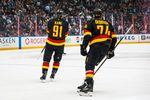 Mar 2, 2026; Vancouver, British Columbia, CAN; Vancouver Canucks forward Jake DeBrusk (74) and forward Evander Kane (91) celebrate Kane’s goal against the Dallas Stars in the first period at Rogers Arena. Mandatory Credit: Bob Frid-Imagn Images