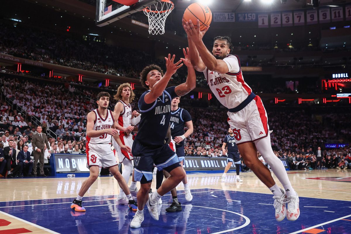 Feb 28, 2026; New York, New York, USA;  Villanova Wildcats guard Tyler Perkins (4) and St. John's Red Storm forward Bryce Hopkins (23) at Madison Square Garden. Mandatory Credit: Wendell Cruz-Imagn Images