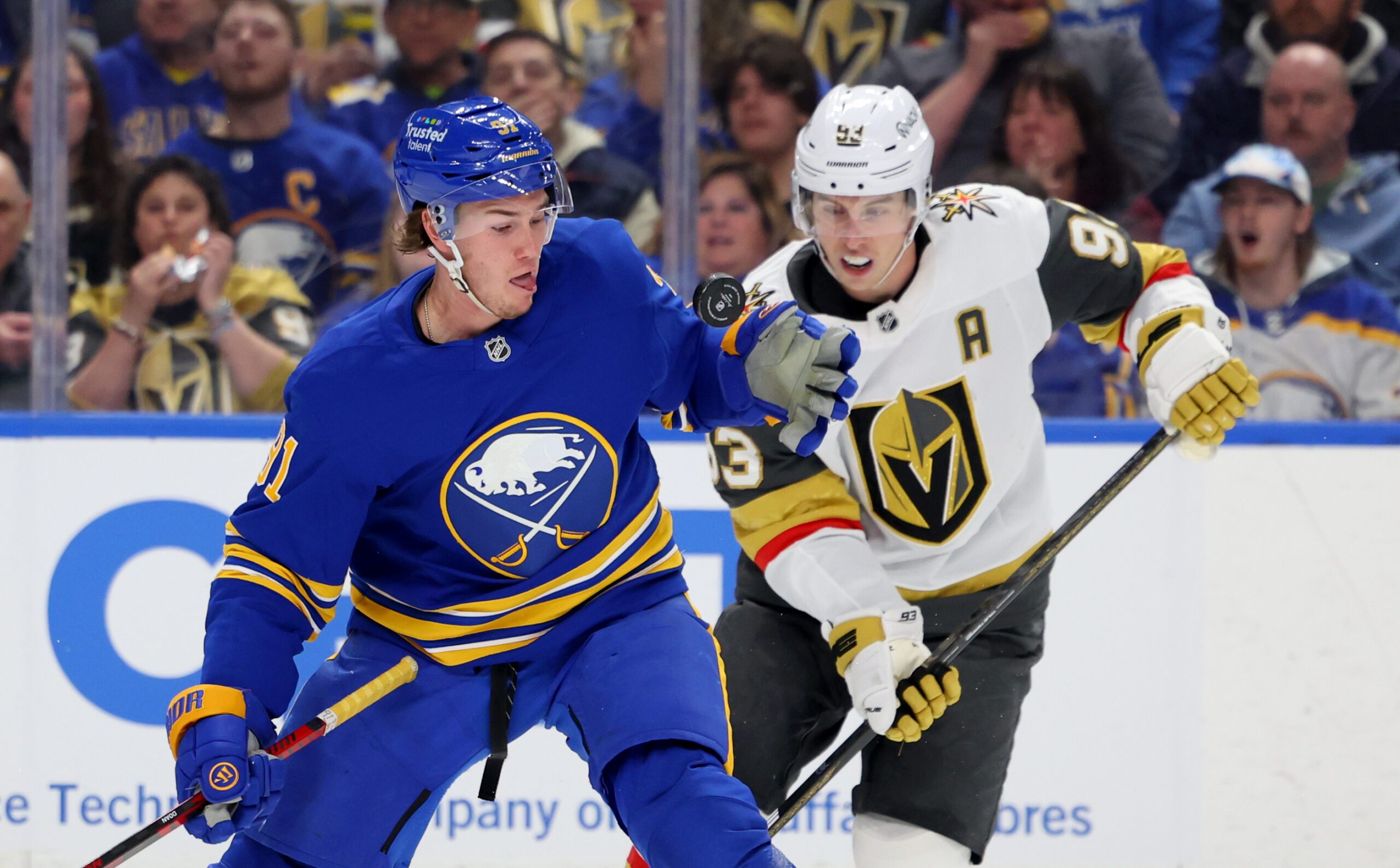 Mar 3, 2026; Buffalo, New York, USA;  Buffalo Sabres right wing Josh Doan (91) looks to glove down the puck during the second period against the Vegas Golden Knights at KeyBank Center. Mandatory Credit: Timothy T. Ludwig-Imagn Images