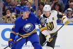 Mar 3, 2026; Buffalo, New York, USA;  Buffalo Sabres right wing Josh Doan (91) looks to glove down the puck during the second period against the Vegas Golden Knights at KeyBank Center. Mandatory Credit: Timothy T. Ludwig-Imagn Images