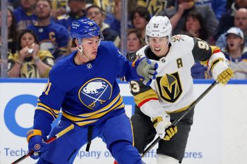 Mar 3, 2026; Buffalo, New York, USA;  Buffalo Sabres right wing Josh Doan (91) looks to glove down the puck during the second period against the Vegas Golden Knights at KeyBank Center. Mandatory Credit: Timothy T. Ludwig-Imagn Images