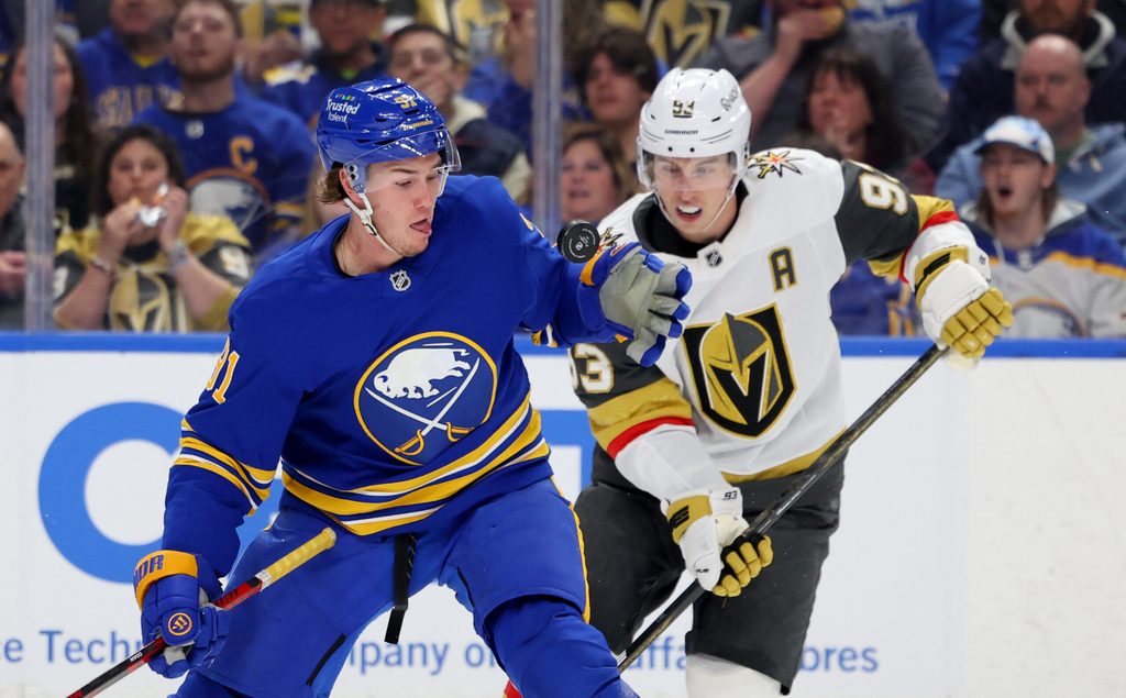 Mar 3, 2026; Buffalo, New York, USA; Buffalo Sabres right wing Josh Doan (91) looks to glove down the puck during the second period against the Vegas Golden Knights at KeyBank Center. Mandatory Credit: Timothy T. Ludwig-Imagn Images