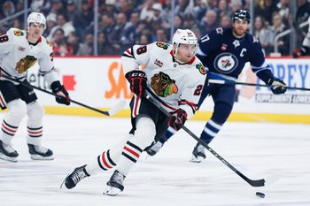 Mar 3, 2026; Winnipeg, Manitoba, CAN;  Chicago Blackhawks forward Andre Burakovsky (28) skates into the Winnipeg Jets zone during the first period at Canada Life Centre. Mandatory Credit: Terrence Lee-Imagn Images