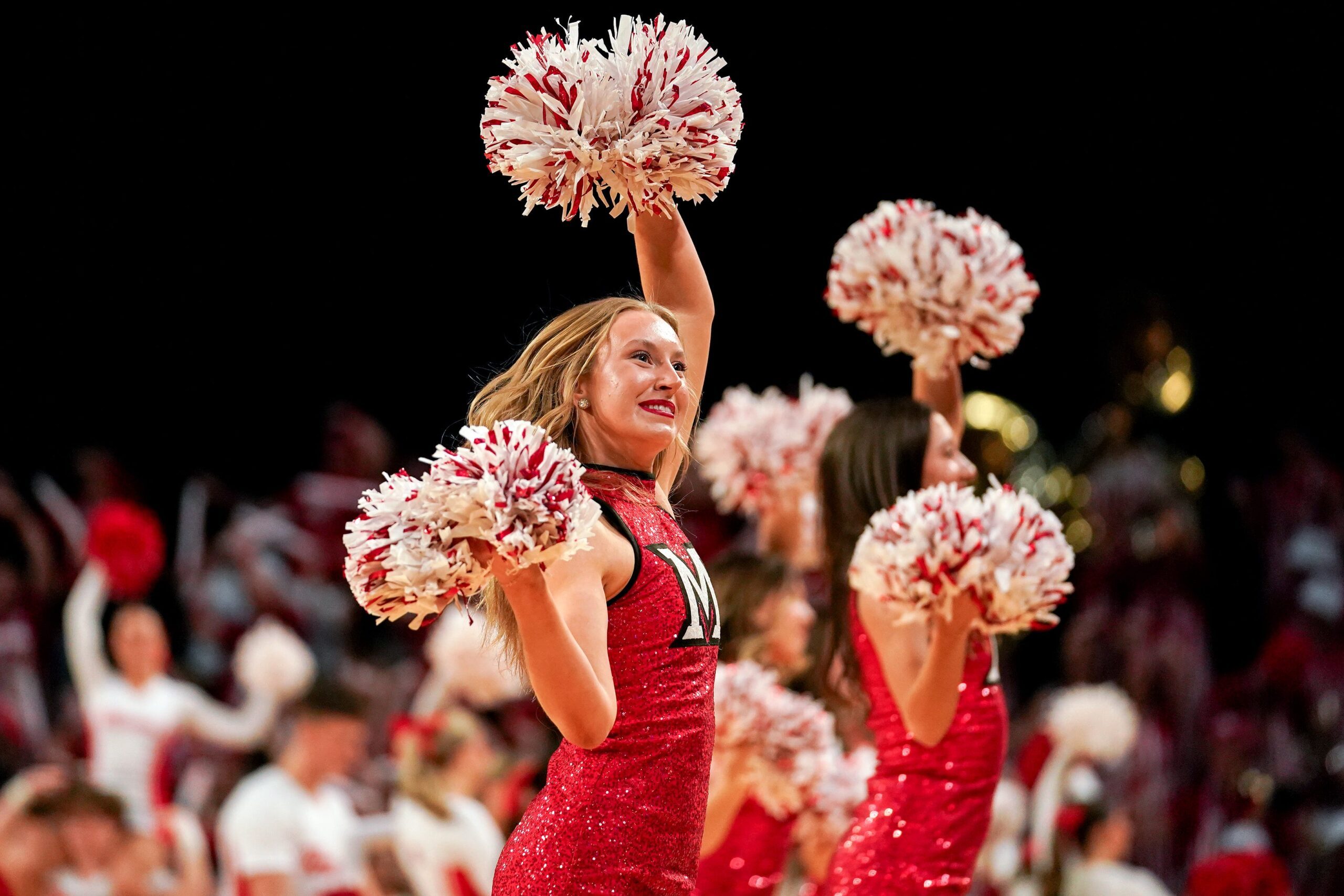 Miami (OH) RedHawks cheerleaders perform a routine during a timeout in the second half of a NCAA men’s basketball game between the Miami Redhawks and Toledo Rockets, Tuesday, March 3, 2026, at Millett Hall in Oxford, Oh.