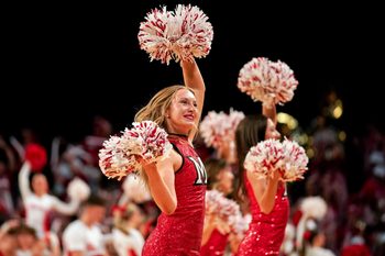 Miami (OH) RedHawks cheerleaders perform a routine during a timeout in the second half of a NCAA men’s basketball game between the Miami Redhawks and Toledo Rockets, Tuesday, March 3, 2026, at Millett Hall in Oxford, Oh.