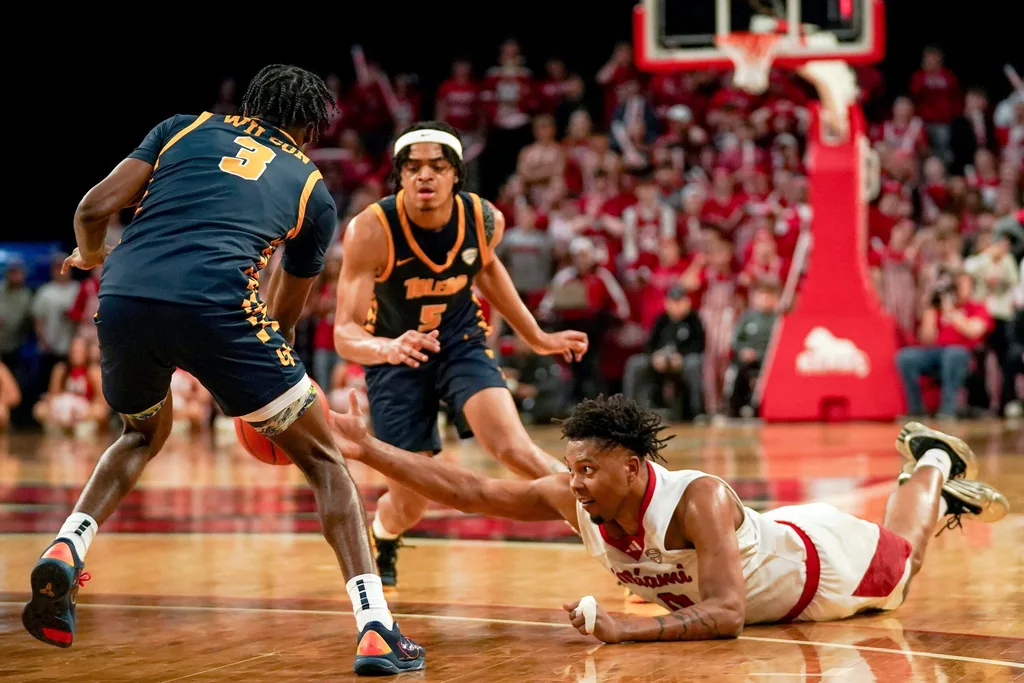 Miami (OH) RedHawks wing Eian Elmer (0) and Toledo Rockets guard Sonny Wilson (3) reach out for a loose ball in the second half of a NCAA men’s basketball game between the Miami Redhawks and Toledo Rockets, Tuesday, March 3, 2026, at Millett Hall in Oxford, Oh. Redhawks won 74-72.