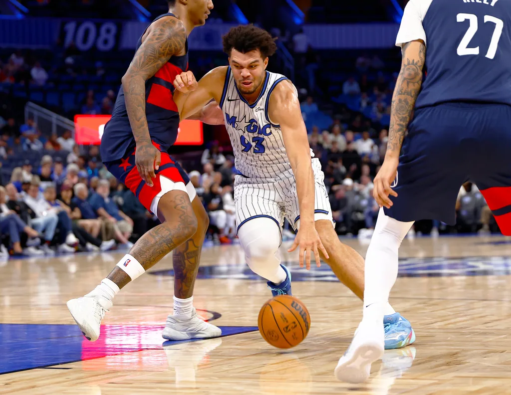 Mar 3, 2026; Orlando, Florida, USA; Orlando Magic forward Noah Penda (93) drives to the basket in the second half against the Washington Wizards at Kia Center. Mandatory Credit: Russell Lansford-Imagn Images