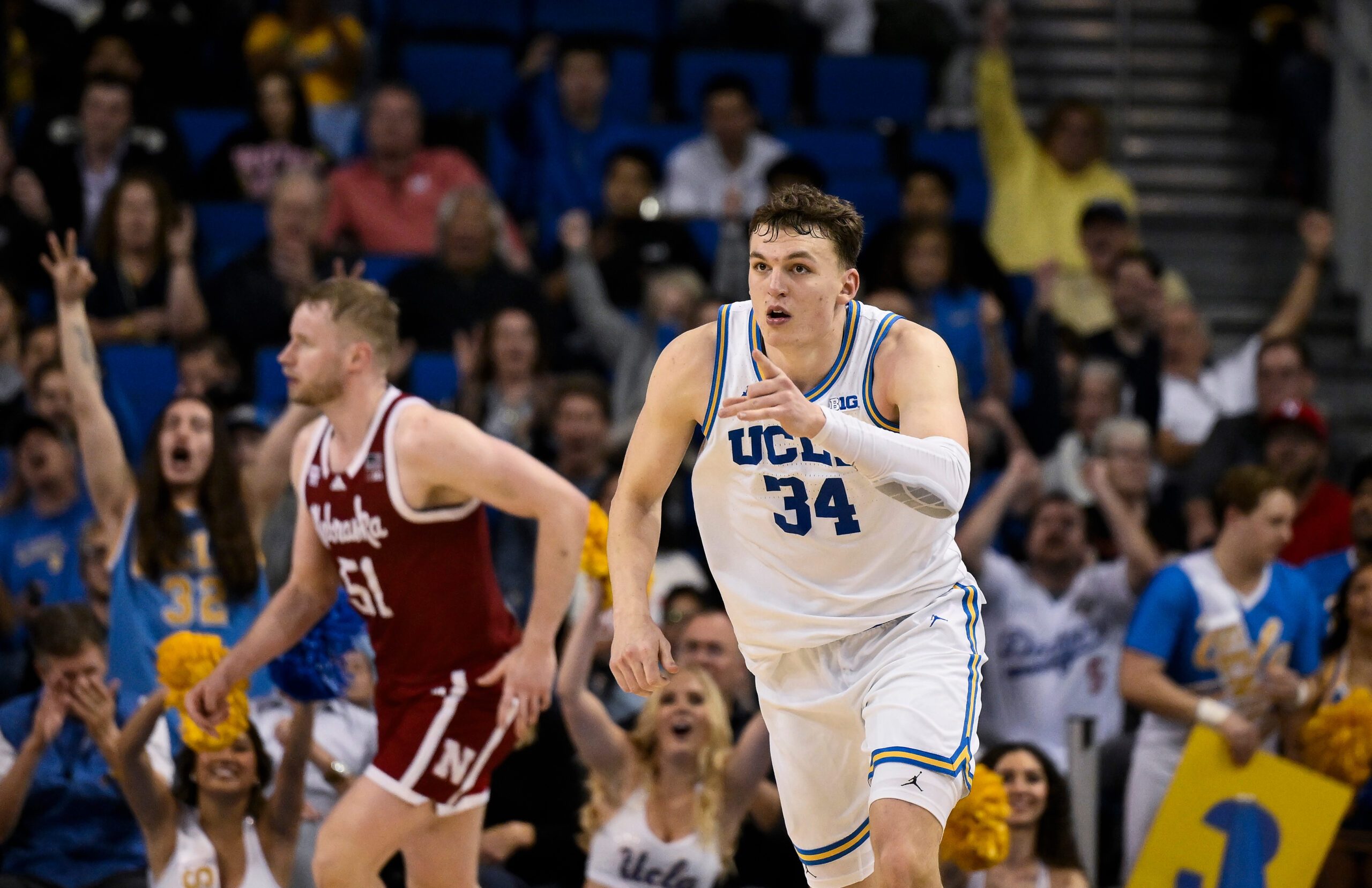 Mar 3, 2026; Los Angeles, California, USA; UCLA Bruins forward Tyler Bilodeau (34) points to teammates after hitting a 3-point jumpshot during the second half at Pauley Pavilion presented by Wescom Financial. Mandatory Credit: Robert Hanashiro-Imagn Images