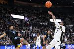 Mar 4, 2026; Providence, Rhode Island, USA; Providence Friars guard Jason Edwards (1) shoots the ball over Marquette Golden Eagles guard Nigel James Jr. (0) during the first half at Amica Mutual Pavilion. Mandatory Credit: Eric Canha-Imagn Images