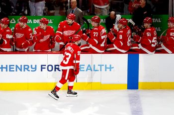 Mar 4, 2026; Detroit, Michigan, USA;  Detroit Red Wings right wing Alex DeBrincat (93) receives congratulations from teammates after scoring in the first period against the Vegas Golden Knights at Little Caesars Arena. Mandatory Credit: Rick Osentoski-Imagn Images