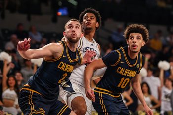Mar 4, 2026; Atlanta, Georgia, USA; California Golden Bears forward John Camden (2) and guard Justin Pippen (10) look for the rebound against Georgia Tech Yellow Jackets guard Jaeden Mustaf (3) during the second half at McCamish Pavilion. Mandatory Credit: Jordan Godfree-Imagn Images