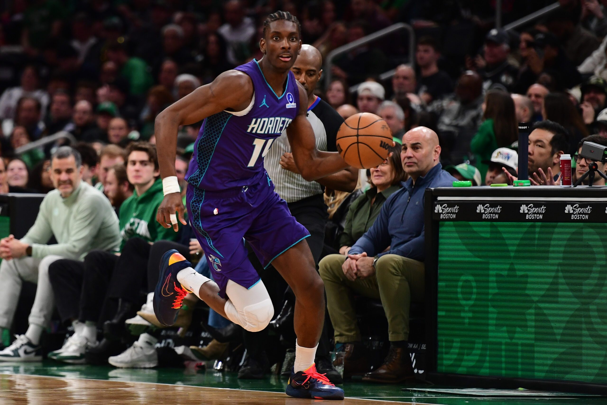 Mar 4, 2026; Boston, Massachusetts, USA; Charlotte Hornets forward Moussa Diabate (14) controls the ball during the second half against the Boston Celtics at TD Garden. Mandatory Credit: Bob DeChiara-Imagn Images