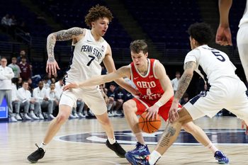 Mar 4, 2026; University Park, Pennsylvania, USA; Ohio State Buckeyes guard Gabe Cupps (4) drives the ball towards the basket as Penn State Nittany Lions guard Freddie Dilione V (5) and guard Dominick Stewart (7) defend during the second half at Bryce Jordan Center. Mandatory Credit: Matthew O'Haren-Imagn Images