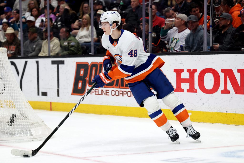 Mar 4, 2026; Anaheim, California, USA; New York Islanders defenseman Matthew Schaefer (48) skates with the puck during the second period against the Anaheim Ducks at Honda Center. Mandatory Credit: Kiyoshi Mio-Imagn Images