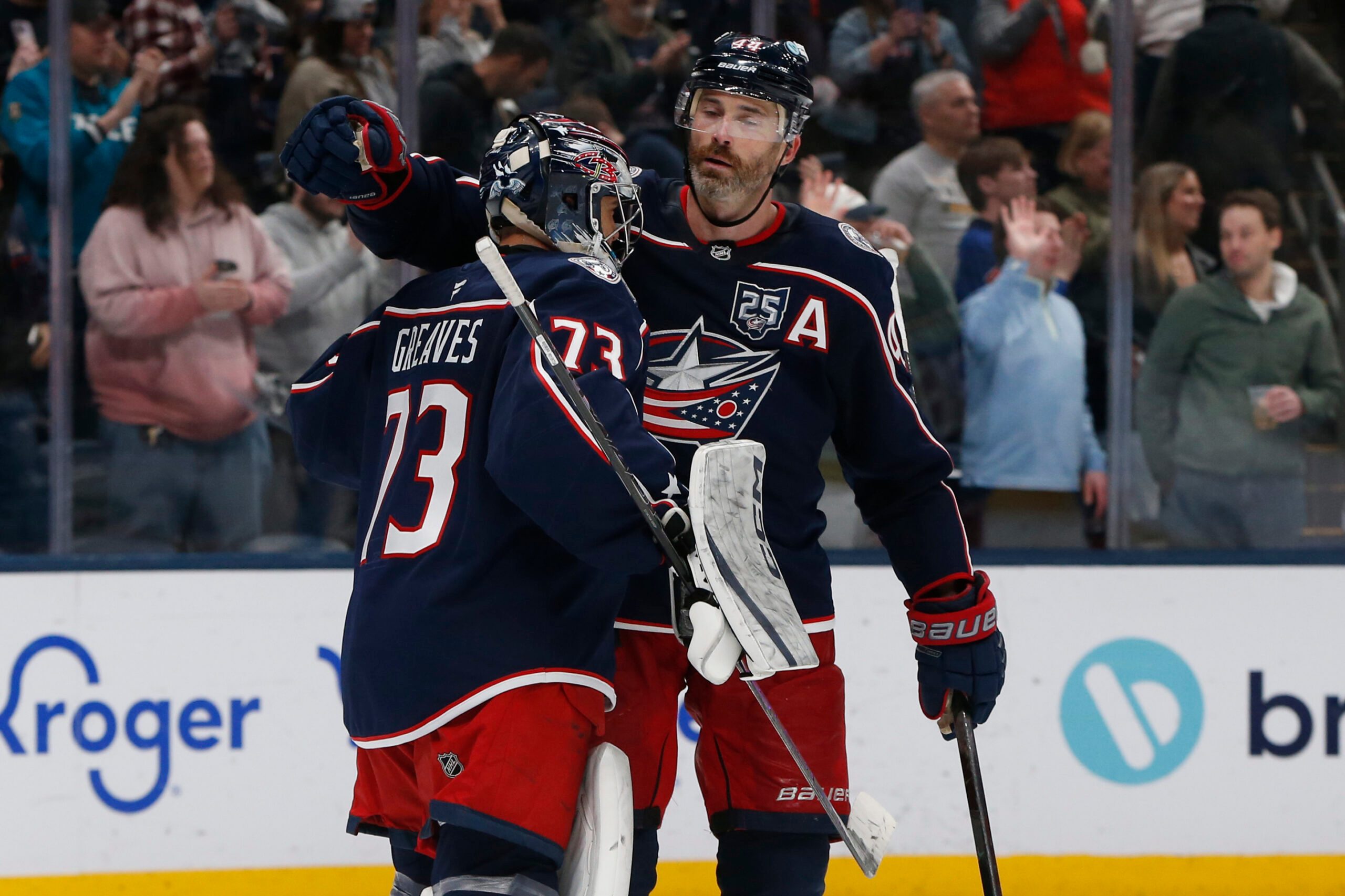 Mar 5, 2026; Columbus, Ohio, USA; Columbus Blue Jackets goalie Jet Greaves (73) and defenseman Erik Gudbranson (44) celebrate the win after the game against the Florida Panthers at Nationwide Arena. Mandatory Credit: Russell LaBounty-Imagn Images