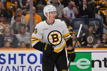 Mar 5, 2026; Nashville, Tennessee, USA;  Boston Bruins center Morgan Geekie (39) celebrates his goal against the Nashville Predators during the second period at Bridgestone Arena. Mandatory Credit: Steve Roberts-Imagn Images