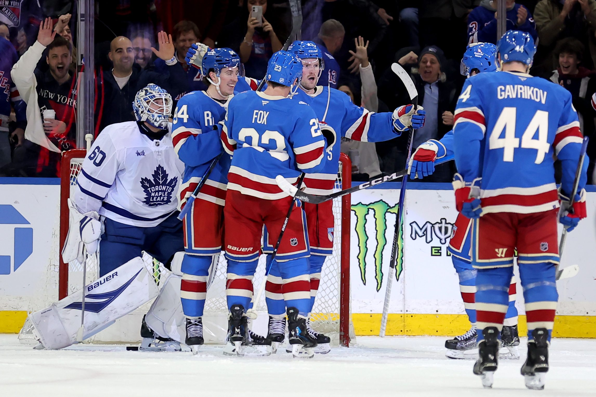 Mar 5, 2026; New York, New York, USA; New York Rangers left wing Alexis Lafreniere (13) celebrates his goal against Toronto Maple Leafs goaltender Joseph Woll (60) with teammates during the third period at Madison Square Garden. Mandatory Credit: Brad Penner-Imagn Images
