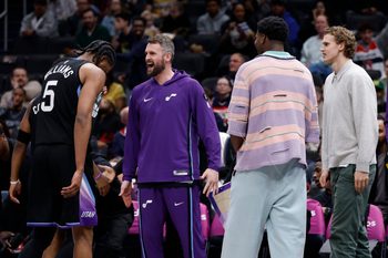 Mar 5, 2026; Washington, District of Columbia, USA; Utah Jazz guard Isaiah Collier (8) and Jazz forward Cody Williams (5) celebrate with teammates on the bench against the Washington Wizards in the second half at Capital One Arena. Mandatory Credit: Geoff Burke-Imagn Images