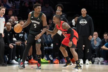 Mar 5, 2026; Minneapolis, Minnesota, USA; Minnesota Timberwolves guard Anthony Edwards (5) dribbles the ball as Toronto Raptors guard Jamal Shead (23) plays defense in the second half at Target Center. Mandatory Credit: Jesse Johnson-Imagn Images