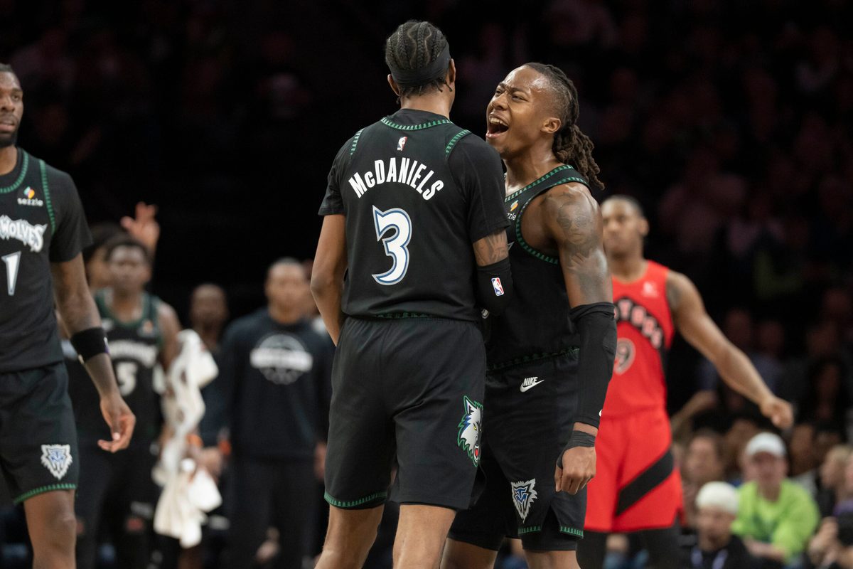 Mar 5, 2026; Minneapolis, Minnesota, USA; Minnesota Timberwolves forward Jaden McDaniels (3) and Minnesota Timberwolves guard Ayo Dosunmu (13) celebrate making a shot against the Toronto Raptors in the second half at Target Center. Mandatory Credit: Jesse Johnson-Imagn Images