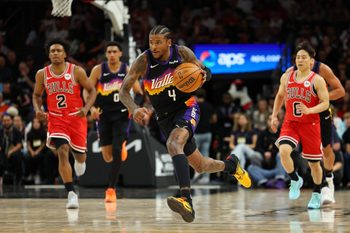 Mar 5, 2026; Phoenix, Arizona, USA; Phoenix Suns guard Jalen Green (4) dribbles down court against the Chicago Bulls in the fourth quarter at Mortgage Matchup Center. Mandatory Credit: Anna Carrington-Imagn Images
