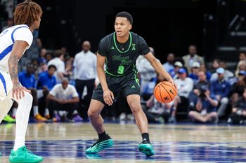 Mar 5, 2026; Memphis, Tennessee, USA; South Florida Bulls guard Gavin Hightower (9) handles the ball against the Memphis Tigers during the second half at FedExForum. Mandatory Credit: Wesley Hale-Imagn Images