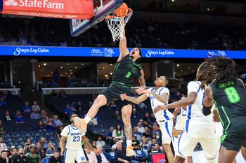 Mar 5, 2026; Memphis, Tennessee, USA; South Florida Bulls forward Isaiah Jones (3) dunks the ball against the Memphis Tigers during the second half at FedExForum. Mandatory Credit: Wesley Hale-Imagn Images