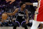 Mar 5, 2026; Sacramento, California, USA; Sacramento Kings guard Malik Monk (0) dribbles the ball against the New Orleans Pelicans during the fourth quarter at Golden 1 Center. Mandatory Credit: Dennis Lee-Imagn Images