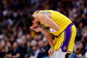 Mar 5, 2026; Denver, Colorado, USA; Los Angeles Lakers guard Luka Doncic (77) reacts after a play in the first quarter against the Denver Nuggets at Ball Arena. Mandatory Credit: Isaiah J. Downing-Imagn Images