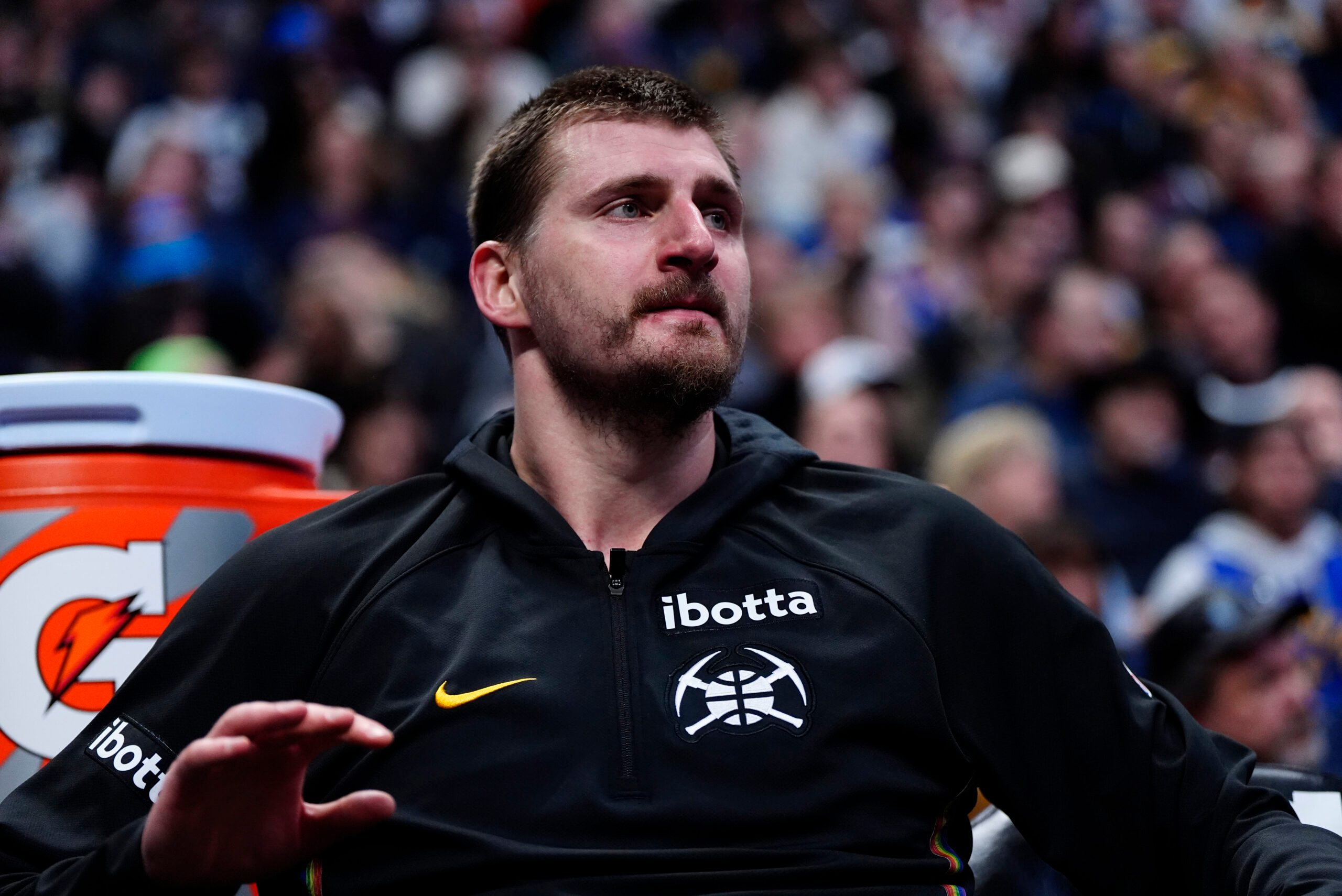Mar 6, 2026; Denver, Colorado, USA; Denver Nuggets center Nikola Jokic (15) on the bench in the fourth quarter against the New York Knicks at Ball Arena. Mandatory Credit: Ron Chenoy-Imagn Images