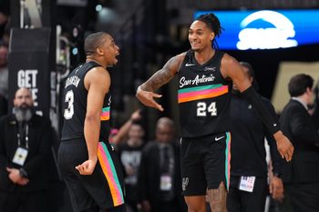 Mar 6, 2026; San Antonio, Texas, USA; San Antonio Spurs guard Devin Vassell (24) and forward Keldon Johnson (3) react during the second half against the Los Angeles Clippers at Frost Bank Center. Mandatory Credit: Scott Wachter-Imagn Images