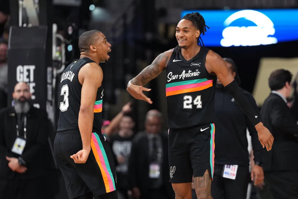 Mar 6, 2026; San Antonio, Texas, USA; San Antonio Spurs guard Devin Vassell (24) and forward Keldon Johnson (3) react during the second half against the Los Angeles Clippers at Frost Bank Center. Mandatory Credit: Scott Wachter-Imagn Images