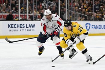 Mar 7, 2026; Boston, Massachusetts, USA; Boston Bruins center Elias Lindholm (28) skates against Washington Capitals left wing Alex Ovechkin (8) during the first period at the TD Garden. Mandatory Credit: Brian Fluharty-Imagn Images