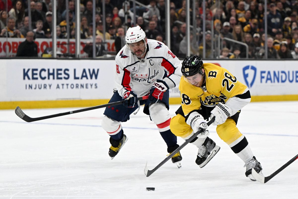 Mar 7, 2026; Boston, Massachusetts, USA; Boston Bruins center Elias Lindholm (28) skates against Washington Capitals left wing Alex Ovechkin (8) during the first period at the TD Garden. Mandatory Credit: Brian Fluharty-Imagn Images