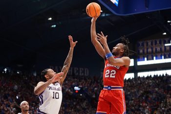 Kansas Jayhawks guard Darryn Peterson (22) shoots the ball against Kansas State Wildcats guard David Castillo (10) during the Sunflower Showdown game in Lawrence, Kansas, on Saturday, March 7, 2026.