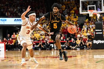 Mar 7, 2026; Ames, Iowa, USA; Arizona State Sun Devils guard Maurice Odum (5) is defended by Iowa State Cyclones guard Tamin Lipsey (3) during the second half at James H. Hilton Coliseum. Mandatory Credit: Jeffrey Becker-Imagn Images