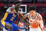 Mar 7, 2026; Syracuse, New York, USA; Syracuse Orange guard Nate Kingz (4) drives against Pittsburgh Panthers guard Barry Dunning Jr. (22) during the second half at the JMA Wireless Dome. Mandatory Credit: Rich Barnes-Imagn Images