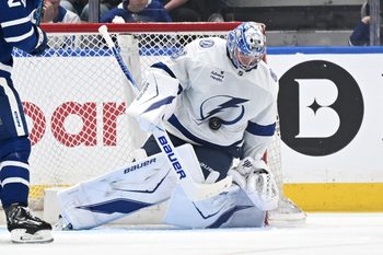 Mar 7, 2026; Toronto, Ontario, CAN;  Tampa Bay Lightning goalie Andrei Vasilevskiy (88) blocks a shot against the Toronto Maple Leafs in the second period at Scotiabank Arena. Mandatory Credit: Dan Hamilton-Imagn Images