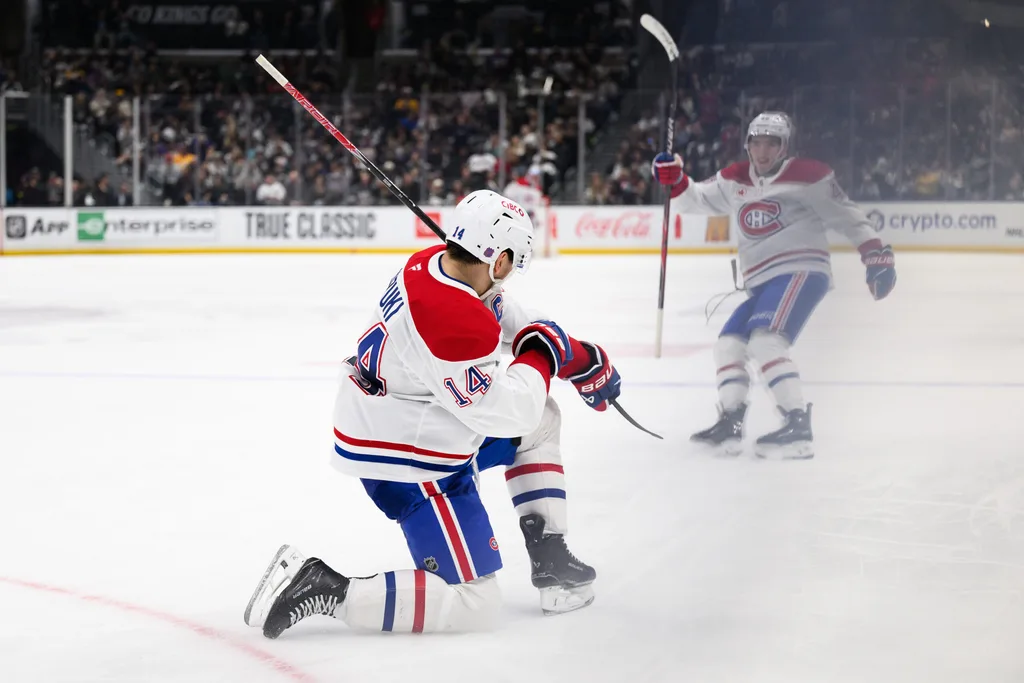 Mar 7, 2026; Los Angeles, California, USA; Montréal Canadiens center Nick Suzuki (14) gestures after scoring during the third period against the Los Angeles Kings at Crypto.com Arena. Mandatory Credit: William Liang-Imagn Images