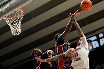 Mar 7, 2026; Tuscaloosa, AL, USA; Auburn guard Kevin Overton (1) fouls Alabama guard Labaron Philon Jr. (0) as Philon’s shot is blocked by Auburn forward Keshawn Murphy (3) at Coleman Coliseum. Alabama defeated Auburn 96-84. Mandatory Credit: Gary Cosby Jr.-Tuscaloosa News