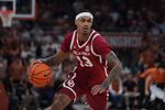 Mar 7, 2026; Austin, Texas, USA; Oklahoma Sooners forward Tae Davis (13) dribbles during the second half against the Texas Longhorns at Moody Center. Mandatory Credit: Dustin Safranek-Imagn Images