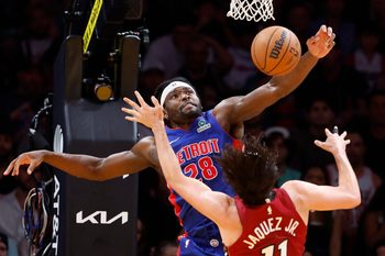 Mar 8, 2026; Miami, Florida, USA;  Detroit Pistons forward Isaiah Stewart (28) blocks a shot by Miami Heat forward Jaime Jaquez Jr. (11) during the second half at Kaseya Center. Mandatory Credit: Rhona Wise-Imagn Images