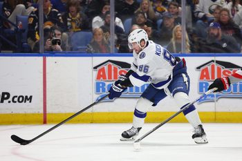 Mar 8, 2026; Buffalo, New York, USA;  Tampa Bay Lightning right wing Nikita Kucherov (86) looks to control the puck during the third period against the Buffalo Sabres at KeyBank Center. Mandatory Credit: Timothy T. Ludwig-Imagn Images