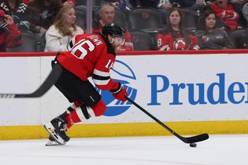 Mar 8, 2026; Newark, New Jersey, USA;  New Jersey Devils right wing Connor Brown (16) controls the puck against the Detroit Red Wings during the third period at Prudential Center. Mandatory Credit: Thomas Salus-Imagn Images
