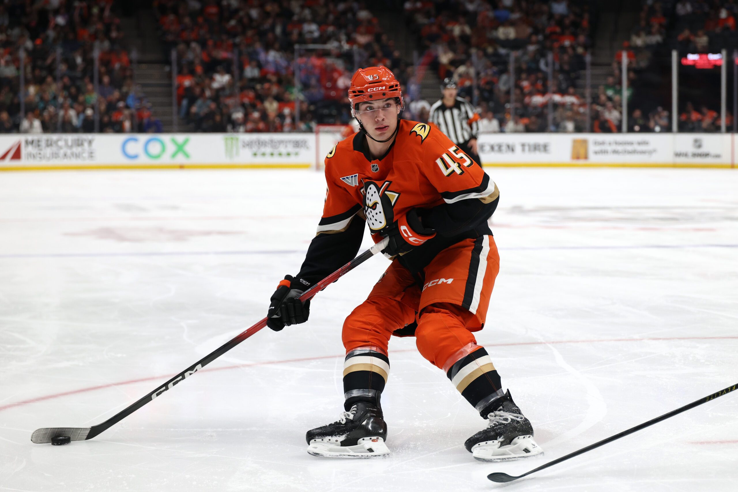 Mar 8, 2026; Anaheim, California, USA; Anaheim Ducks right wing Beckett Sennecke (45) controls the puck during the second period against the St. Louis Blues at Honda Center. Mandatory Credit: Kiyoshi Mio-Imagn Images
